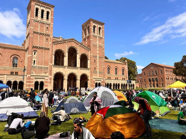 Pro-Palestine demonstrators occupy an encampment on the campus of UCLA on April 25, 2024 in Los Angeles, California.  Activists at UCLA have joined a range of campuses across the United States who have started encampments to call on their universities to divest financial ties from Israel. (Photo by Sarah Reingewirtz, Los Angeles Daily News/SGNG)
