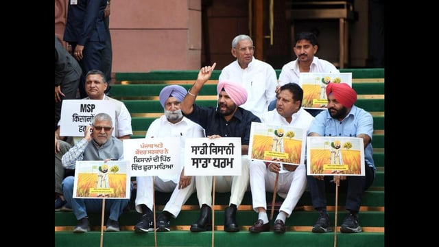 Punjab Congress president Amarinder Singh Raja Warring along with party MPs staged a protest against Punjab and the central government on the issue of removal of farmers from Punjab - Haryana Khanauri border and Shambhu border on the Parliament premises in New Delhi on Thursday. (ANI Photo/Rahul Singh)