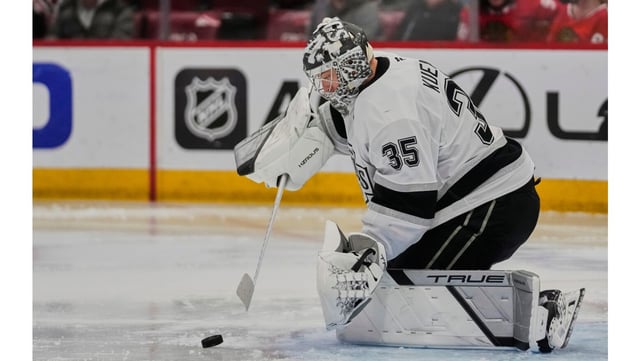 Kings goaltender Darcy Kuemper makes a save during the second period of their 3-1 victory over the Chicago Blackhawks on Thursday night in Chicago. Kuemper made 17 saves and has allowed just five goals in his last six games. (AP Photo/Erin Hooley)