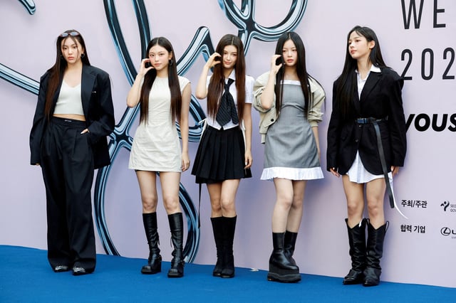 K-pop girl band NewJeans poses for a photograph during 2025 SS Seoul Fashion Week at Dongdaemun Design Plaza (DDP) in Seoul, South Korea, September 3, 2024. REUTERS/Kim Soo-hyeon/File Photo
