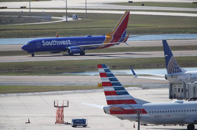 A Southwest airlines passenger jet taxies at the Orlando International Airport, on Thursday, Feb. 6, 2025. There is push to replace the Central Florida Terminal Radar Approach Control (TRACON) facility. It was built in 1983, and local leaders say it is badly outdated and needs to be replaced...(Ricardo Ramirez Buxeda/ Orlando Sentinel)