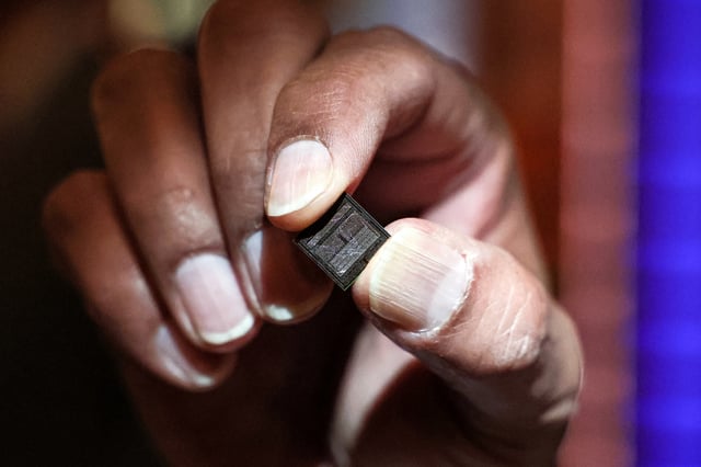 A Micron Technology chip on display in New York City, U.S., April 26, 2024. REUTERS/Brendan McDermid/File Photo