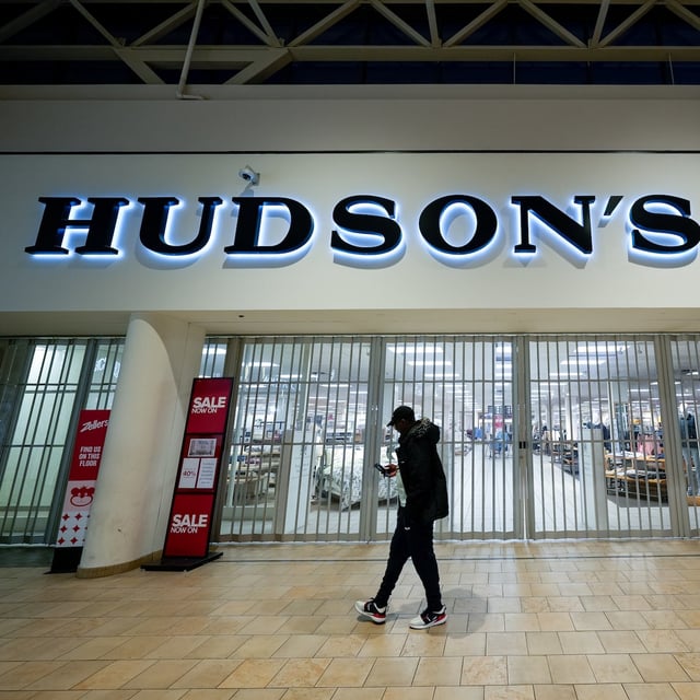 HAMILTON, CANADA - MARCH 20: A person walks by a closed Hudson's Bay store in a mall on March 20, 2025 in Hamilton, Canada. The fate of Canada's oldest company is uncertain as an Ontario judge granted an extension on its liquidation plan until March 21. (Photo by Katherine KY Cheng/Getty Images)