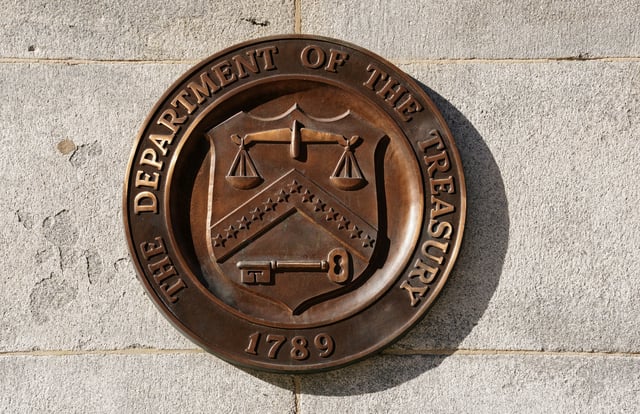 A bronze seal for the Department of the Treasury is shown at the U.S. Treasury building in Washington, U.S., January 20, 2023.  REUTERS/Kevin Lamarque/File Photo