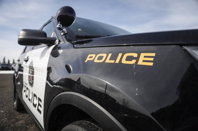 A police vehicle is shown at Calgary Police Service headquarters in Calgary, Alta., Thursday, April 9, 2020. 