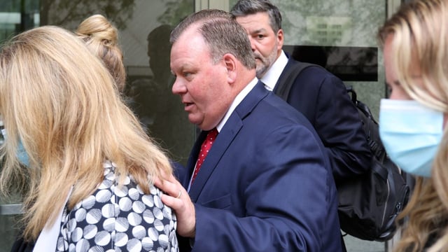 Surrounded by supporters, Patrick Daley Thompson leaves the Dirksen U.S. Courthouse in Chicago, July 6, 2022, after being sentenced to four months in prison. (Terrence Antonio James/Chicago Tribune)