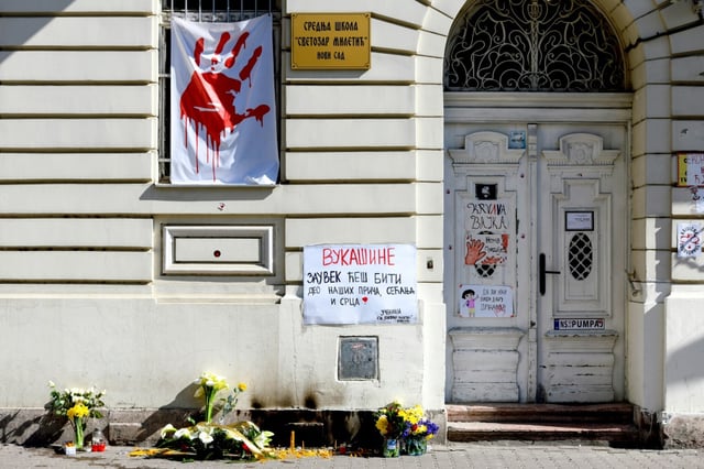 A makeshift memorial sprang up at the school attended by the latest victim of the disaster