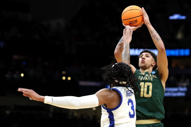 Nique Clifford #10 of the Colorado State Rams shoots the ball against Colby Rogers #3 of the Memphis Tigers during the second half in the first round of the NCAA Men&#39;s Basketball Tournament.