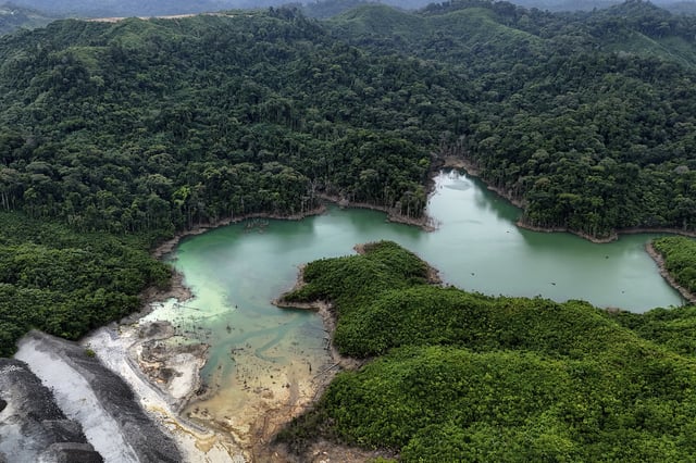 A tailing pond sits in the Cobre Panamá copper mine, owned by Canada's First Quantum Minerals, during a media tour of the mine that was closed after Panama's Supreme Court ruled that the government concession was unconstitutional, in Donoso, Panama, Friday, March 21, 2025. (AP Photo/Matias Delacroix)