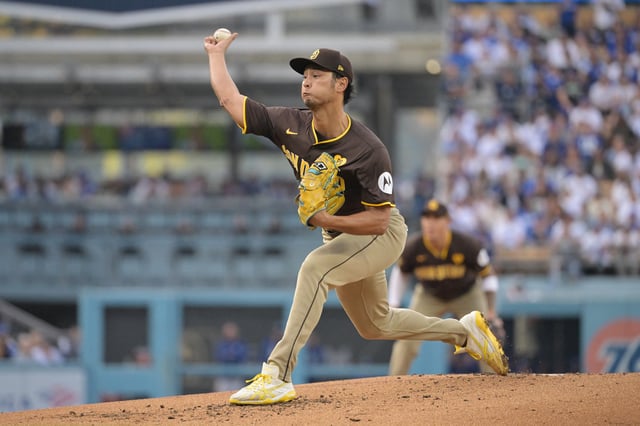 Oct 11, 2024; Los Angeles, California, USA; San Diego Padres pitcher Yu Darvish (11) pitches in the second inning against the Los Angeles Dodgers during game five of the NLDS for the 2024 MLB Playoffs at Dodger Stadium. Mandatory Credit: Jayne Kamin-Oncea-Imagn Images/ File Photo