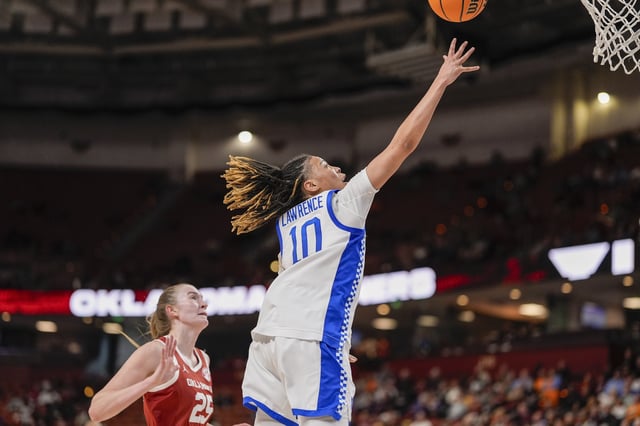 Mar 7, 2025; Greenville, SC, USA;Kentucky Wildcats guard Dazia Lawrence (10) drives to the basket past Oklahoma Sooners center Landry Allen (25) during the second half at Bon Secours Wellness Arena. Mandatory Credit: Jim Dedmon-Imagn Images/ File Photo
