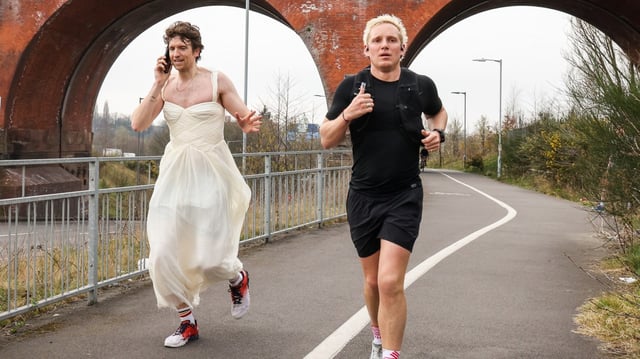 Laing was joined in Stockport by his fellow presenter Greg James, who ran in a wedding gown to fulfil a pledge made on air