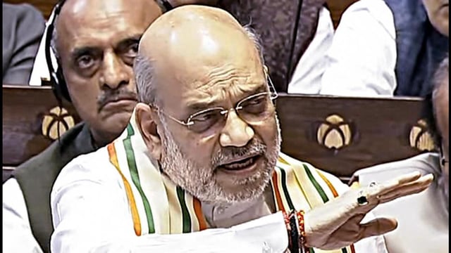 Union home minister Amit Shah speaks in the Rajya Sabha during the Budget Session of the Parliament, in New Delhi on Friday. (Sansad TV)