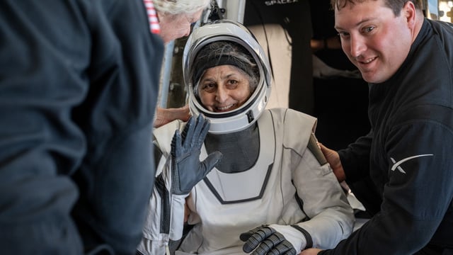 NASA astronaut Sunita Williams is helped out of a SpaceX Dragon spacecraft onboard the SpaceX recovery ship MEGAN after she, NASA astronaut Nick Hague, and Butch Wilmore, and Roscosmos cosmonaut Aleksandr Gorbunov landed in the water off the coast of Tallahassee, Florida, March 19, 2025. 