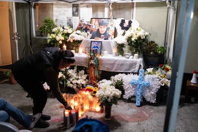 The memorial at the home of Derbing Jose Alvarado Gonzalez grows after family and classmates gathered in the monthly Ceasefire Nightwalk in honor of the teenager, who was slain during an attempted robbery as he walked to soccer practice with friends after school.
