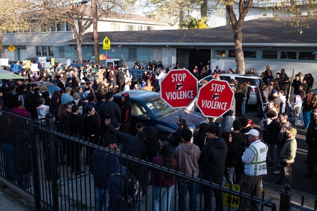 Community members gathered for a vigil and march on Friday, March 21, 2025 in honor of Derbing Jose Alvarado Gonzalez, a 15-year-old college prep student shot to death during an attempted robbery as he walked with friends to soccer practice after school. 