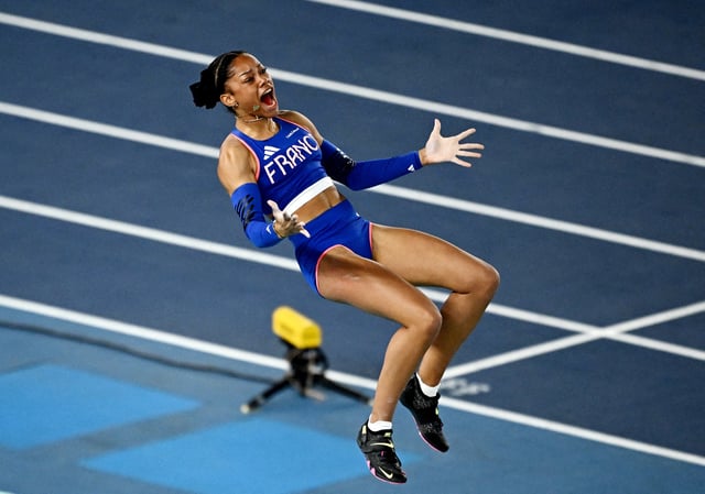 Athletics - World Athletics Indoor Championships - Nanjing Youth Olympic Sports Park, Nanjing, China - March 22, 2025 France's Marie-Julie Bonnin reacts during the women's pole vault final REUTERS/Dylan Martinez