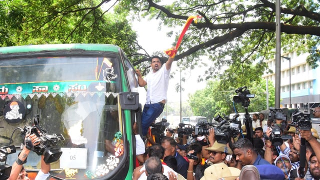Pro-kannada activists raise slogans during their protest at Town Hall.