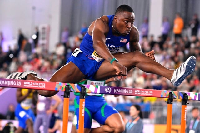 USA‘s Grant Holloway in action in the 60m hurdles at the world indoor athletics championships in Nanjing, China