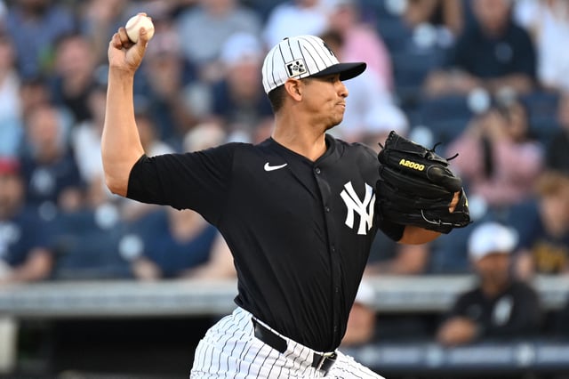 Mar 19, 2025; Tampa, Florida, USA; New York Yankees starting pitcher Carlos Carrasco (59) throws a pitch in the first inning against the Atlanta Braves during spring training at George M. Steinbrenner Field. Mandatory Credit: Jonathan Dyer-Imagn Images/File Photo