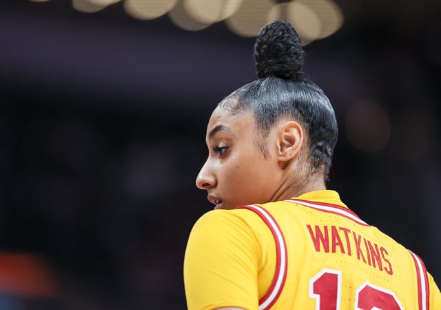 JuJu Watkins #12 of the USC Trojans looks on during the game against the Michigan Wolverines in the Big Ten Women&#39;s Basketball Tournament semifinals at Gainbridge Fieldhouse on March 8, 2025 in Indianapolis, Indiana.