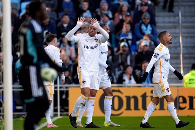 Galaxy forward Christian Ramirez (17), front center, celebrates after scoring a goal during the first half of an MLS soccer match against Minnesota United, Saturday, March 22, 2025, in St. Paul, Minn. (AP Photo/Abbie Parr)