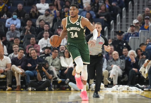 Giannis Antetokounmpo #34 of the Milwaukee Bucks dribbles the ball up court against the Golden State Warriors during the first half of an NBA basketball game at Chase Center on March 18, 2025 in San Francisco, California.