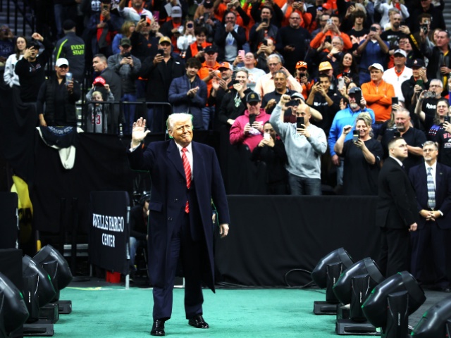 President Donald Trump waves as he arrives at the NCAA Division I Wrestling Championship on March 22, 2025 in Philadelphia, Pennsylvania. Trump last attended the NCAA wrestling championship in 2023 and has attended high-level sporting events since becoming president in January. (Photo by Kayla Bartkowski/Getty Images)