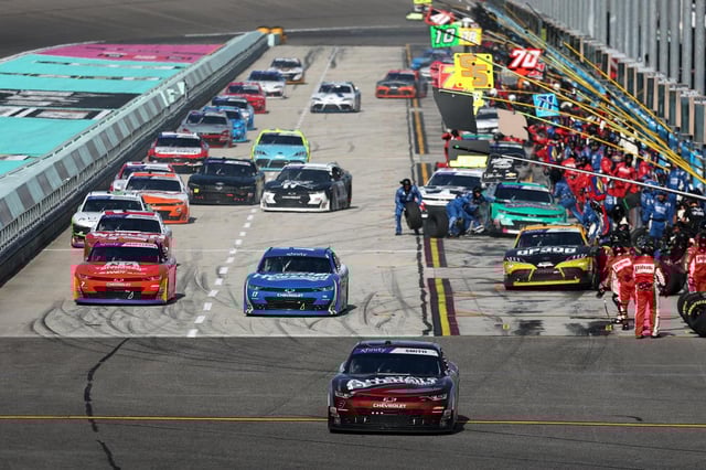 Sammy Smith, driver of the #8 Allstate Peterbilt Group Chevrolet, Kyle Larson, driver of the #17 HendrickCars.com Chevrolet, and Justin Allgaier, driver of the #7 BRANDT/TradeMark Nitrogen Chevrolet, exit pit road during the NASCAR Xfinity Series Hard Rock Bet 300 at Homestead-Miami Speedway on March 22, 2025, in Homestead, Florida. (Chris Graythen/Getty Images North America/TNS)