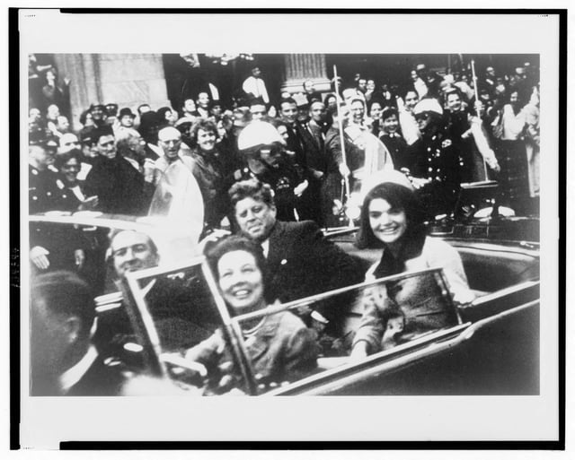 U.S. President John F. Kennedy (C), first lady Jacqueline Kennedy (R) and Texas Governor John Connally (L) and his wife are pictured riding in the presidential motorcade moments before Kennedy was shot in Dallas, Texas, in this handout image taken on November 22, 1963.