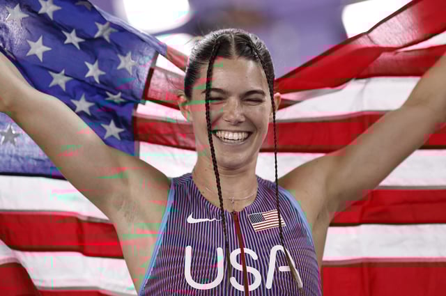 Athletics - World Athletics Indoor Championships - Nanjing Youth Olympic Sports Park, Nanjing, China - March 23, 2025 Claire Bryant of the U.S. celebrates after winning gold in the women's long jump final REUTERS/Tingshu Wang