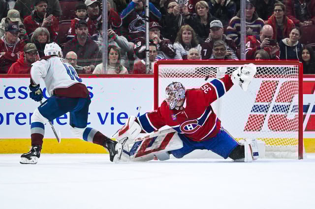 Mar 22, 2025; Montreal, Quebec, CAN; Colorado Avalanche center Charlie Coyle (10) scores a goal against Montreal Canadiens goalie Sam Montembeault (35) in shootout at Bell Centre. Mandatory Credit: David Kirouac-Imagn Images