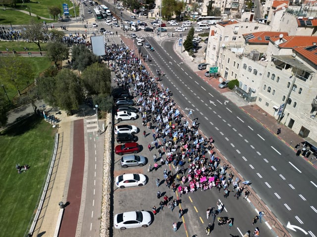 A drone view shows a protest against moves by the Israeli government to fire the Attorney General Gali Baharav Miara and the dismissal of top security agency chief, Ronen Bar, in Jerusalem, March 23, 2025. REUTERS/Ilan Rosenberg