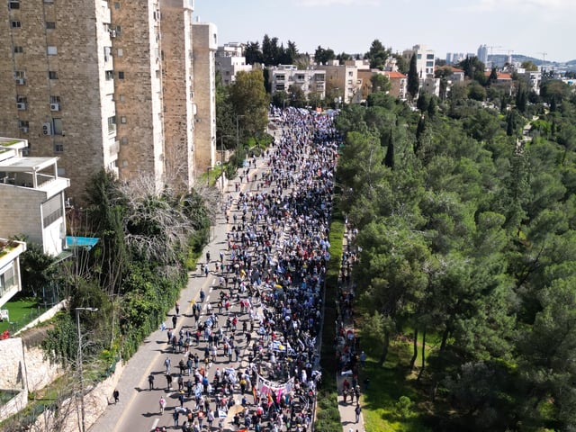 A drone view shows a protest against moves by the Israeli government to fire the Attorney General Gali Baharav Miara and the dismissal of top security agency chief, Ronen Bar, in Jerusalem, March 23, 2025. REUTERS/Ilan Rosenberg