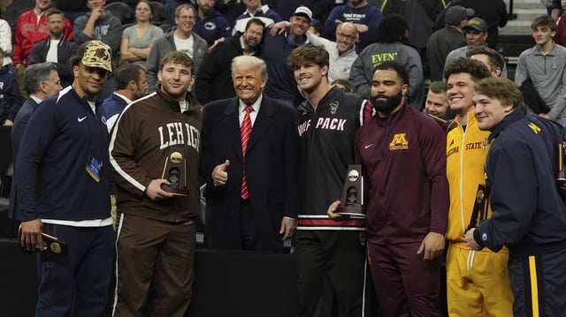President Donald Trump attends the finals at the NCAA wrestling championship, Saturday, March 22, 2025, in Philadelphia.