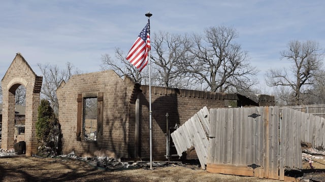 A home charred in the wildfire in the US.