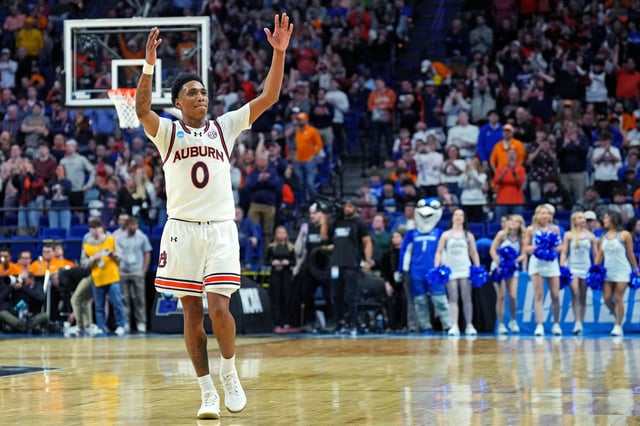Mar 22, 2025; Lexington, KY, USA;  Auburn Tigers guard Tahaad Pettiford (0) celebrates during the second half against the Creighton Bluejays in the second round to the NCAA Tournament at Rupp Arena. Mandatory Credit: Aaron Doster-Imagn Images