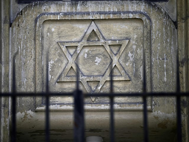 A photograph taken on October 9, 2023 shows a star of David on the facade of a synagogue in central Paris, two days after security measures have been reinforced near Jewish temples and schools. The Palestinian militant group Hamas launched a shock deadly attack on Israel, which has declared war on Gaza, sparking fear of an escalating conflict in the crude-rich Middle East. (Photo by JULIEN DE ROSA / AFP) (Photo by JULIEN DE ROSA/AFP via Getty Images)