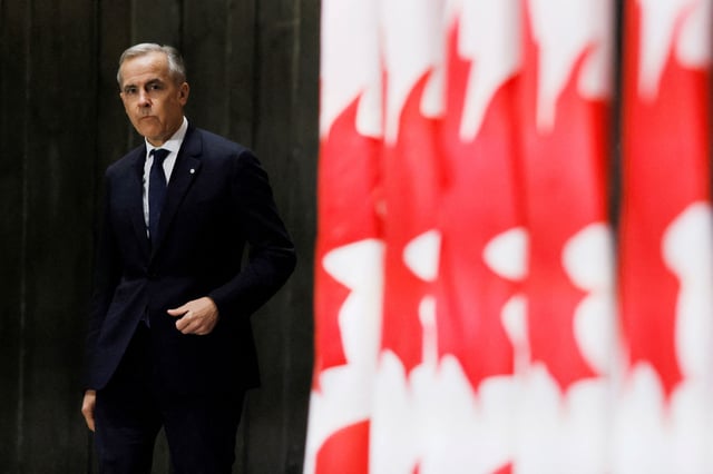 Canada's Prime Minister Mark Carney arrives to a press conference after meeting with provincial and territorial leaders at the Canadian War Museum in Ottawa, Ontario, Canada March 21, 2025.