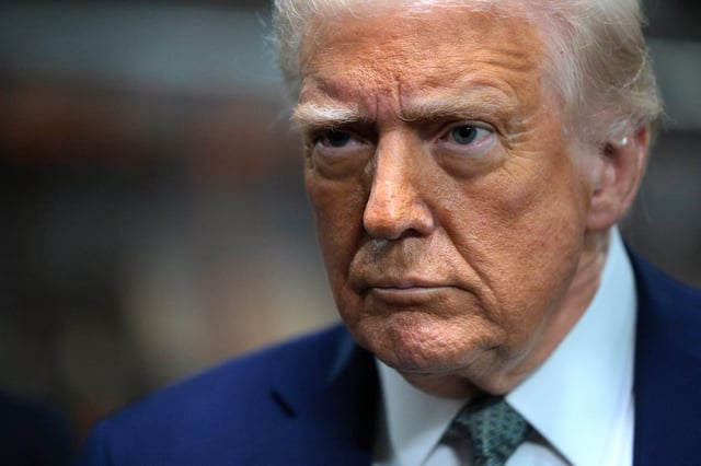 President Donald Trump speaks to the media during a guided tour of the John F. Kennedy Center for the Performing Arts before leading a board meeting on March 17, 2025 in Washington, DC.