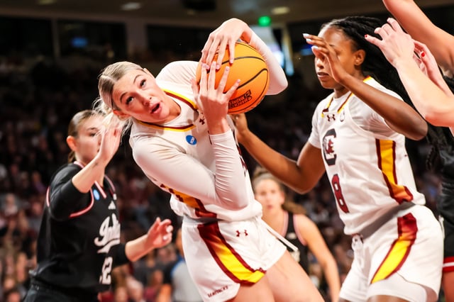 Mar 23, 2025; Columbia, South Carolina, USA; South Carolina Gamecocks forward Chloe Kitts (21) grabs a rebound against the Indiana Hoosiers in the first half at Colonial Life Arena. Jeff Blake-Imagn Images