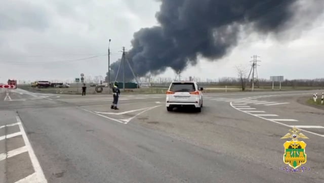 Black smoke rises from the site of fire following an explosion at an oil depot, which was recently hit by a drone what local authorities called a Ukrainian a military strike, in the settlement of Kavkazskaya in the Krasnodar region, Russia, in this still image from video released March 21, 2025. Krasnodar Region's Ministry of Internal Affairs/Handout via REUTERS