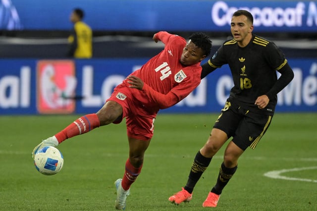 Mar 23, 2025; Inglewood, California, USA; Panama midfielder Janpol Morales (14) shoots the ball against Mexico in the second half during the Concacaf Nations League final at SoFi Stadium. Mandatory Credit: Jayne Kamin-Oncea-Imagn Images