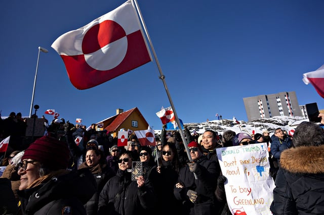 Protesters march in front of the US consulate in Nuuk, Greenland, on March 15, 2025.