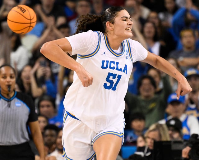 Lauren Betts celebrates after scoring a basket during UCLA's win over Richmond.