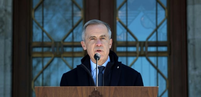 AFP - Le Premier ministre canadien Mark Carney annonce un scrutin anticipé, lors d'un discours, à Ottawa, le 23 mars 2025
