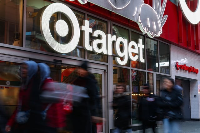 People walk by a Target store in midtown Manhattan in New York City, U.S., March 21, 2025. REUTERS/Kylie Cooper/File Photo