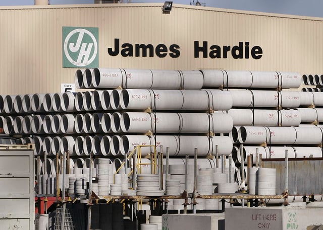 FILE - Australian building supplies company James Hardie site in western Sydney, Australia, Sept. 21, 2004. (AP Photo/Mark Baker, File)