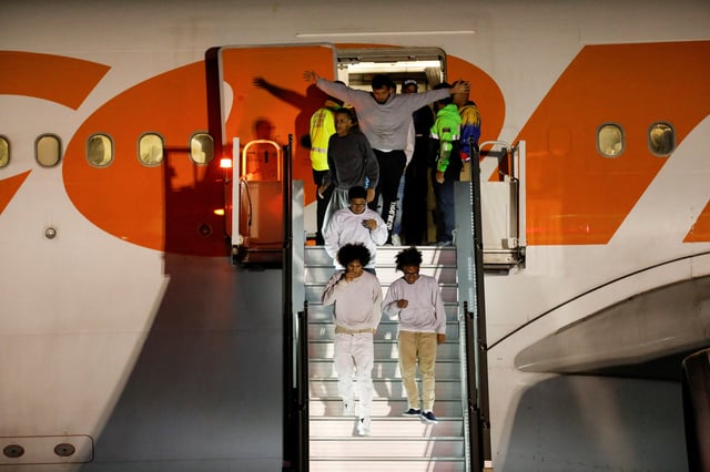 Venezuelan migrants arrive on a flight after being deported from the United States, in Caracas, Venezuela, March 24, 2025. REUTERS/Leonardo Fernandez Viloria