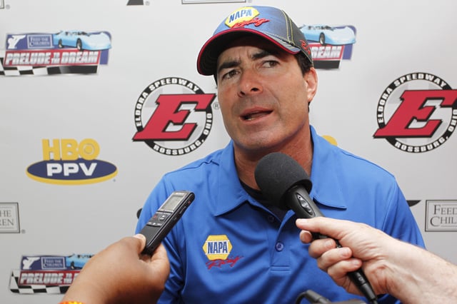Ron Capps, driver of the #28, is interviewed by the media before the start of the Feed the Children Prelude to the Dream at Eldora Speedway on June 6, 2012 in Rossburg, Ohio.